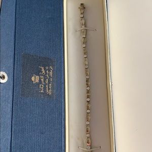 Stamped silver bracelet.